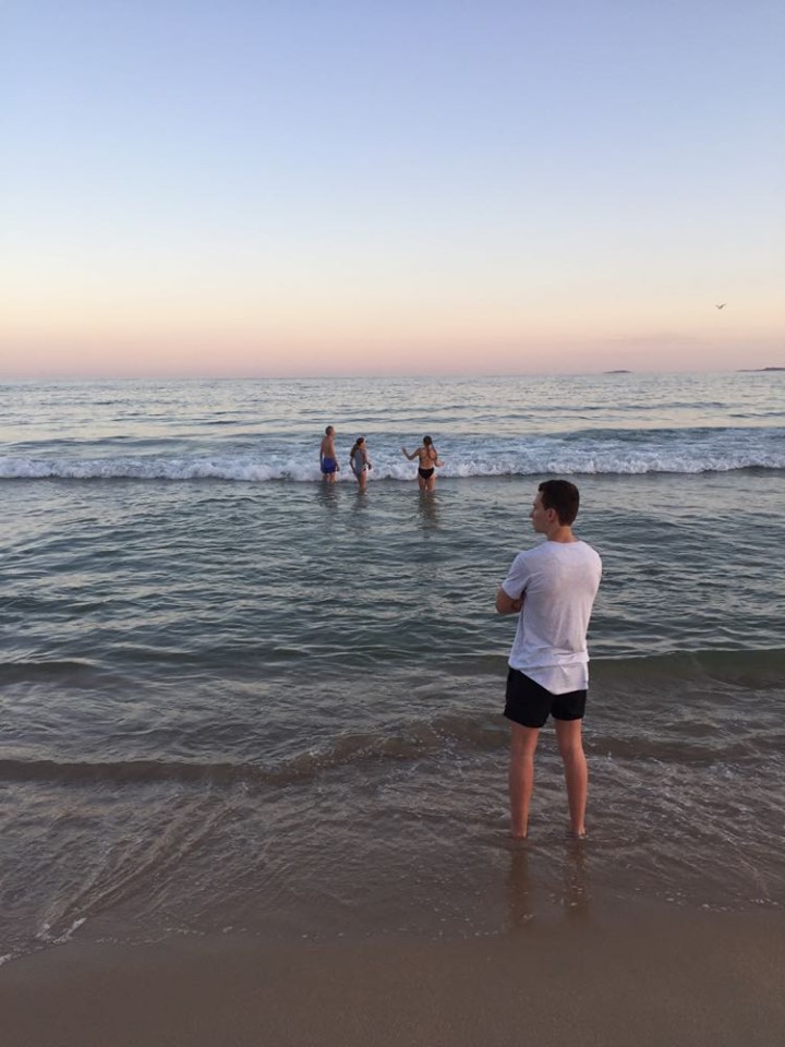 Sunset city beach with M, J, S, E