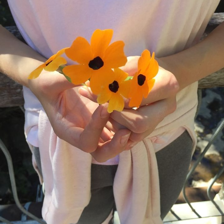 Esther holding flowers
